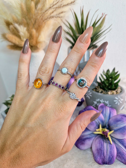 Anello con MOISSANITE, LARIMAR, MALACOLLA, GRANATO, AMBRA