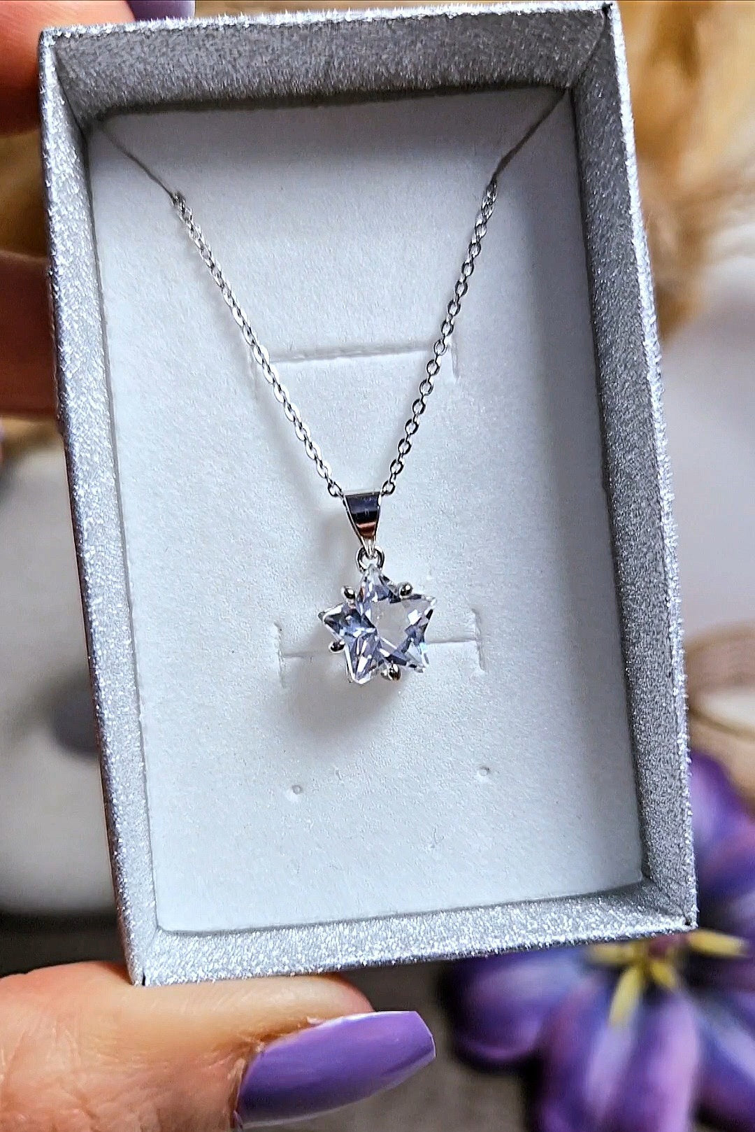 Ciondolo a stella con QUARZO IALINO